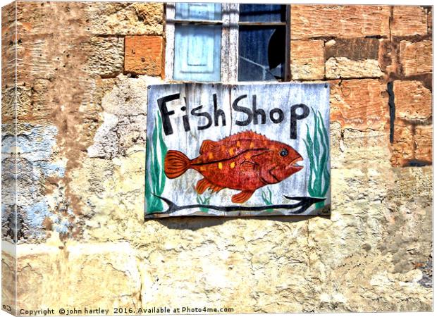 Artistic Fish Shop Sign on a Character Wall Canvas Print by john hartley