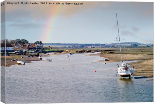 Rainbow over Burnham Overy Staithe North Norfolk Canvas Print by john hartley