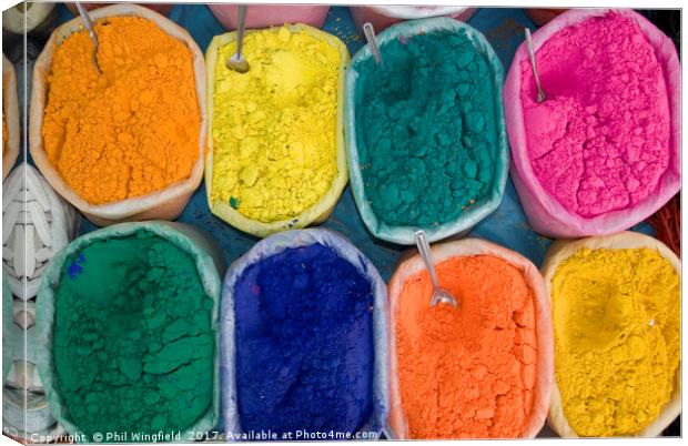Coloured powders in an Indian Market Canvas Print by Phil Wingfield
