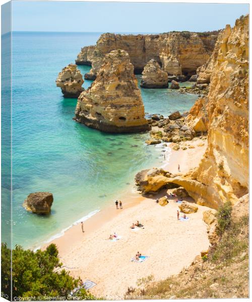 Praia da Marinha Canvas Print by Sebastien Greber