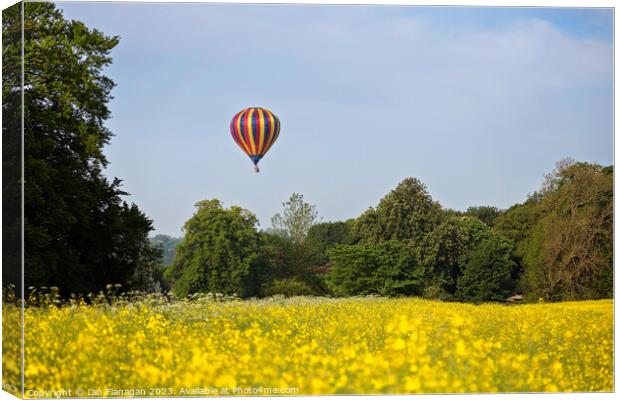 "Serenity Soaring: Hot Air Balloon Gracefully Floa Canvas Print by Ian Flanagan