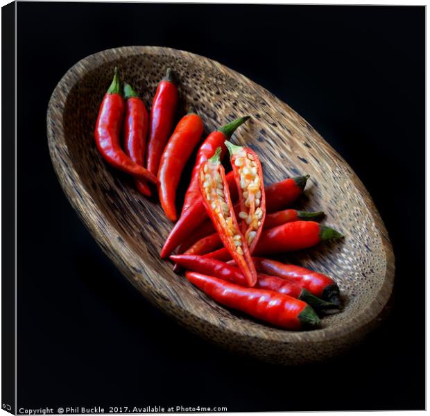 Red Chillies in Bowl Canvas Print by Phil Buckle