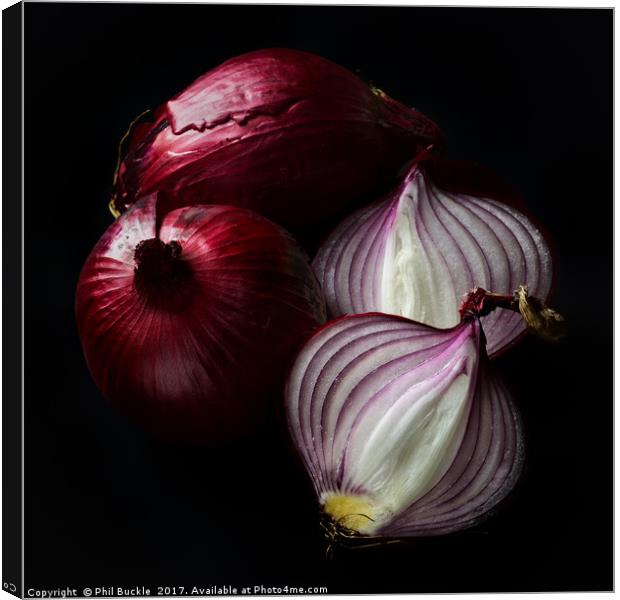 Red Onions Canvas Print by Phil Buckle