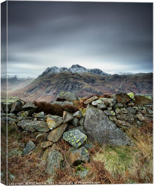 Langdales Beyond the Wall Canvas Print by Phil Buckle
