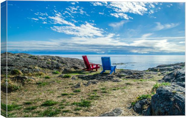Adirondack Chairs looking to sea Canvas Print by Alf Damp