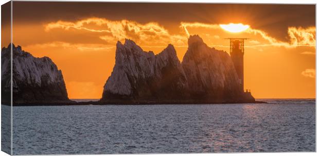 Setting sun over the lighthouse Canvas Print by Alf Damp