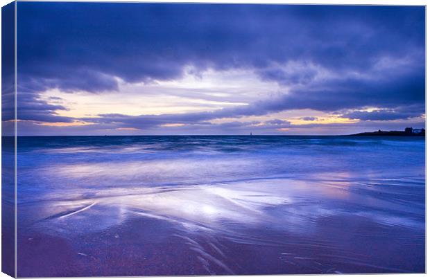 Sunset over Eile Beach Canvas Print by Malcolm Smith