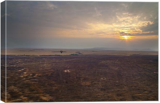 Hot air over the Mara 2 Canvas Print by Malcolm Smith