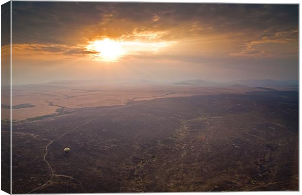 Masai Mara sunrise Canvas Print by Malcolm Smith