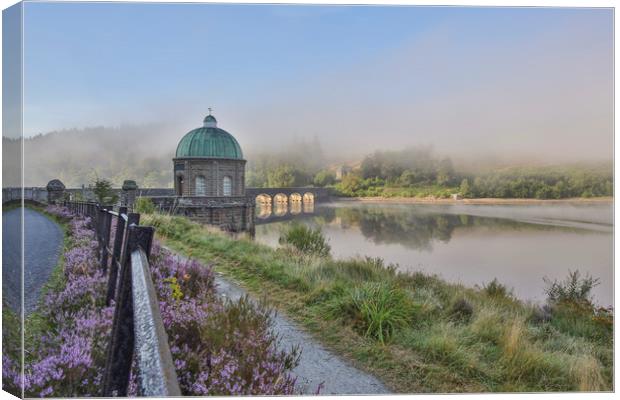 Garreg Ddu Dam as sun floods through the arches Canvas Print by Sorcha Lewis