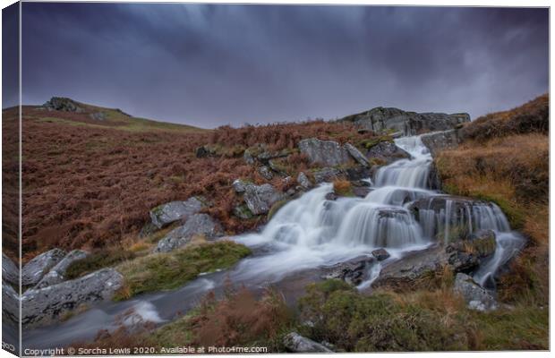 Welsh Waterfall under a moody sky Canvas Print by Sorcha Lewis