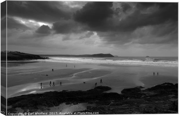 Stormy Polzeath in Cornwall, England. Canvas Print by Carl Whitfield