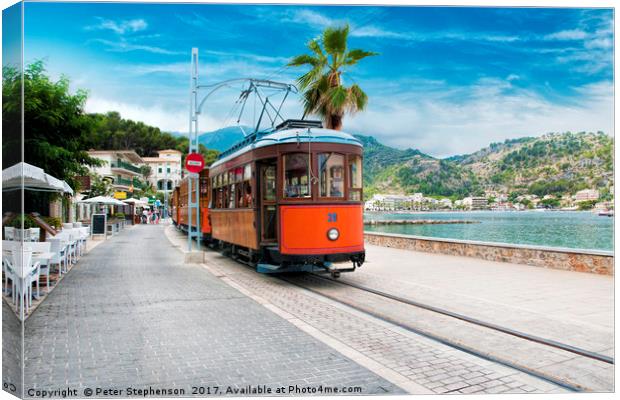 Old Wooden Tram tram on Port De Soller seafront Canvas Print by Peter Stephenson