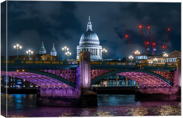 Southwark Bridge and St Paul's Cathedral at Night Canvas Print by John Frid