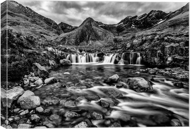 Fairy Pools and Cuillin Mountains Canvas Print by John Frid