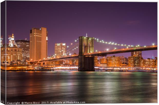 Night view of the Brooklyn Bridge  Canvas Print by Marco Bicci