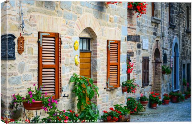 Town in Umbria, Italy Canvas Print by Marco Bicci