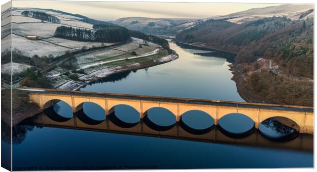 Ladybower winter reflections Canvas Print by Graham Morris
