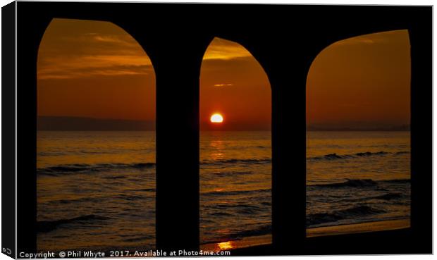 Sunset through the arches Canvas Print by Phil Whyte