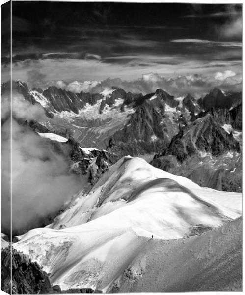 Mountaineer on L'arete de Aiguille du Midi Canvas Print by Nick Lukey