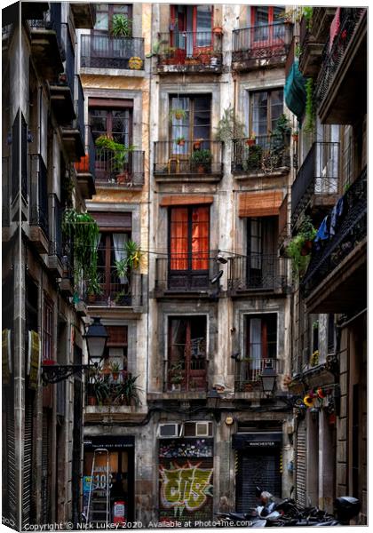 Courtyard in the artist quarter Barcelona Canvas Print by Nick Lukey