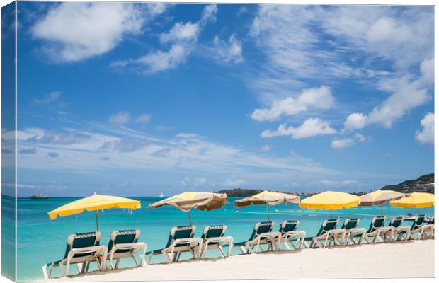 Chaise Lounges Under Umbrellas on Beach Canvas Print by Darryl Brooks