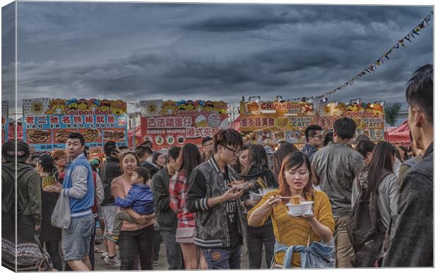 Eating Noodles at Night Market Canvas Print by Darryl Brooks