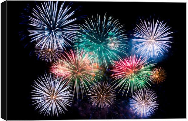 Colorful explosions of festive fireworks Canvas Print by Dobrydnev Sergei