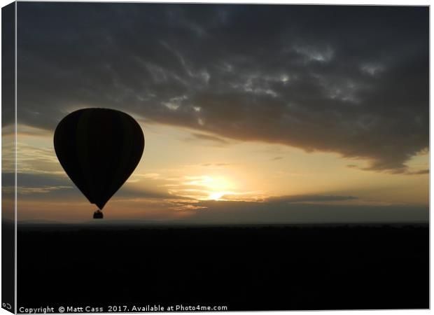 Photo of an Air Balloon at sunset over the plains  Canvas Print by Matt Cass