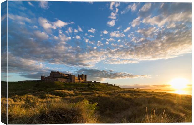 Bamburgh Castle at Sunset Canvas Print by Nigel Smith