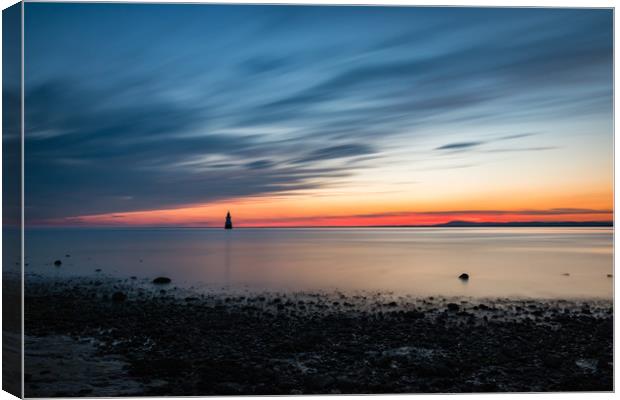 Sunset over Plover Scar Lighthouse Canvas Print by Nigel Smith