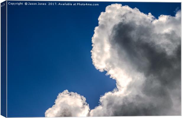 Dramatic Clouds in Blue Sky Canvas Print by Jason Jones