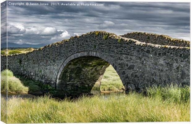 Eighteenth Century Bridge on Isle of Anglesey Canvas Print by Jason Jones