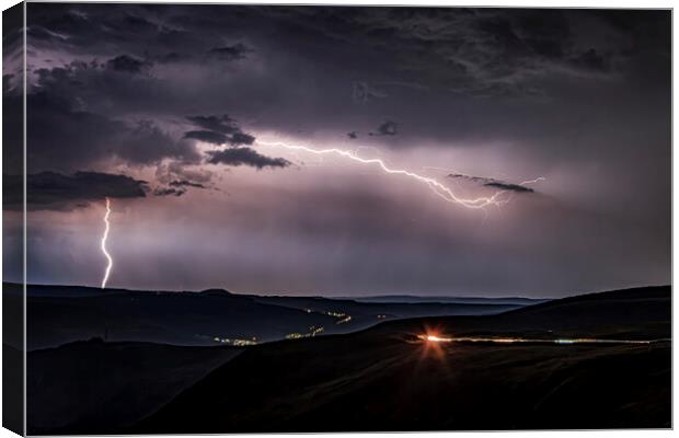 Lightning Strike on the mountain Canvas Print by Emma Woodhouse