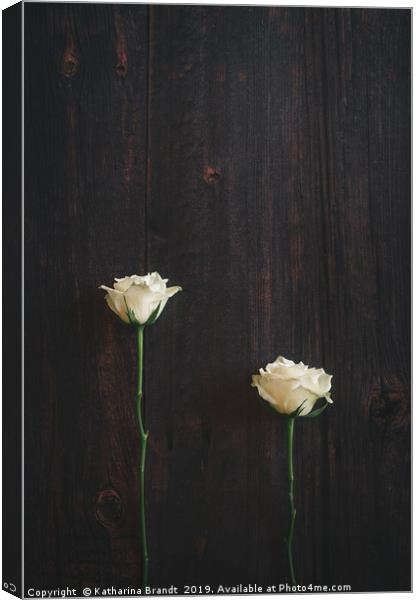 Two Roses on Wooden background Canvas Print by KB Photo