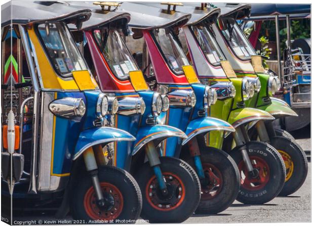 Tuk-tuks lined up in a row, Canvas Print by Kevin Hellon
