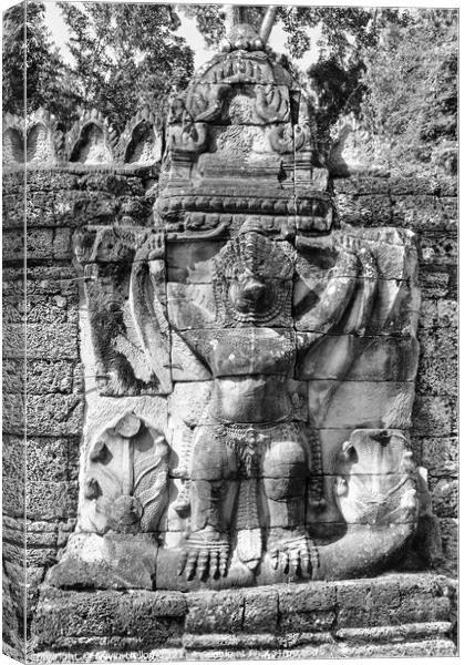 Stone carving on temple building Canvas Print by Kevin Hellon