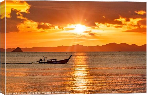 Long tail boat on the Andaman Sea at sunset  Canvas Print by Kevin Hellon
