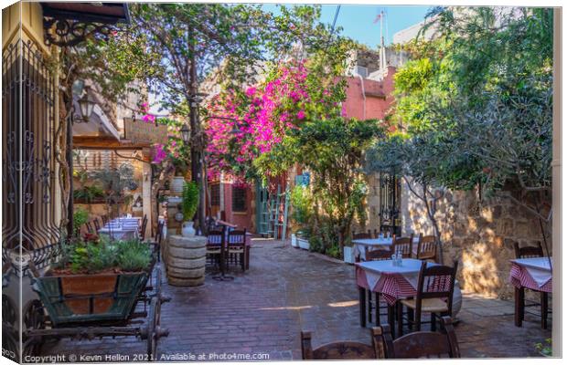 Outdoor restaurant in Chania Canvas Print by Kevin Hellon