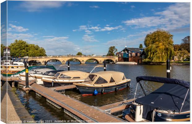Boats moopred at Henley on Thames Canvas Print by Kevin Hellon