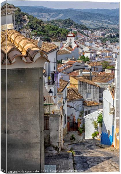Narrow, steep street overlooking Ubrique, Canvas Print by Kevin Hellon