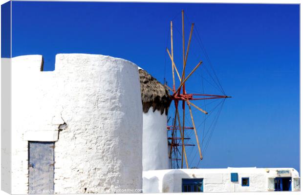  Windmill on Mykonos, Greece Canvas Print by Kevin Hellon