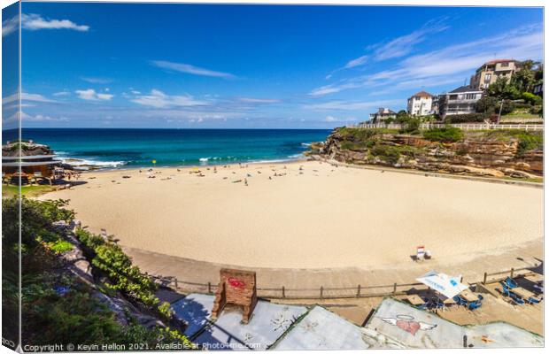 Tamarama beach on a sunny day. Canvas Print by Kevin Hellon