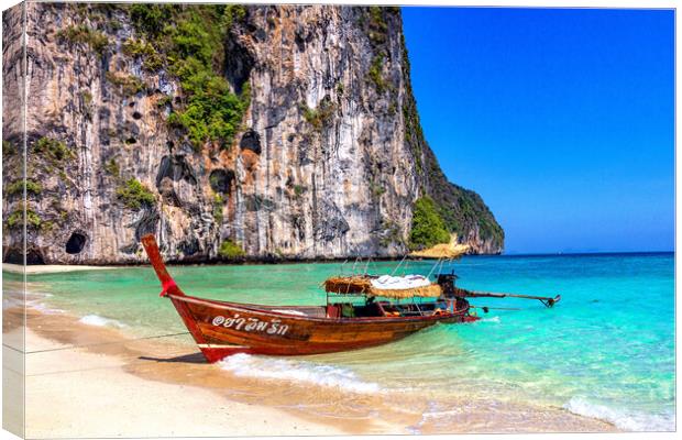 Traditional long tail fishing boat beached on Koh Lao Liang, Tra Canvas Print by Kevin Hellon