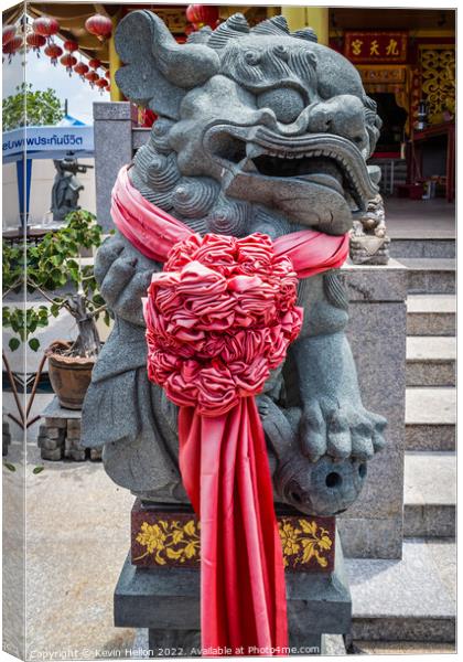 Temple lion statue outside a Chinese temple, Canvas Print by Kevin Hellon