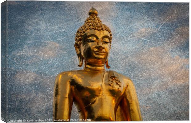 Golden Buddha statue Canvas Print by Kevin Hellon