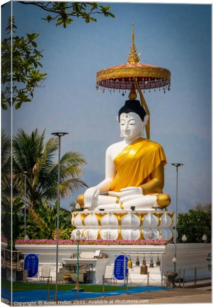 Buddha statue and Thai flag,  Canvas Print by Kevin Hellon