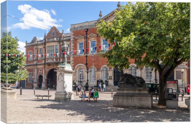 Statue of Charles Crompton with the old County Hall in the backg Canvas Print by Kevin Hellon