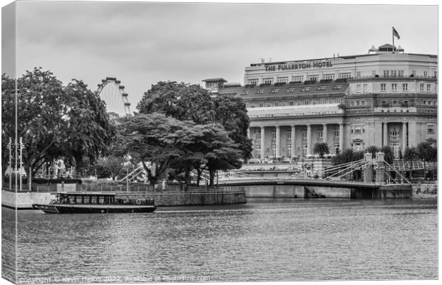The Fullerton Hotel and bum boat, Singapore Canvas Print by Kevin Hellon