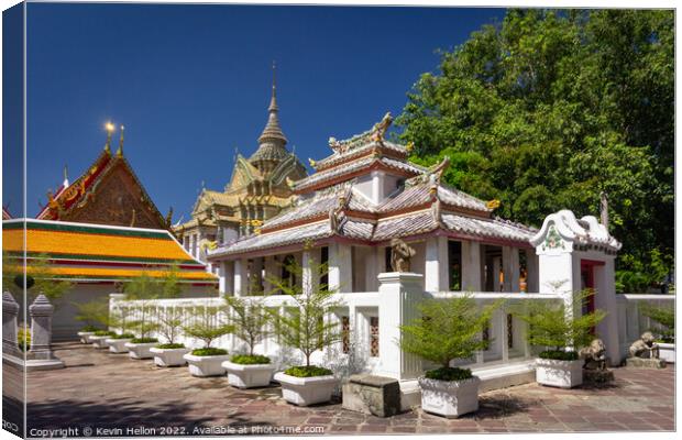 Stupas, Wat Pho, Bangkok, Thailand Canvas Print by Kevin Hellon
